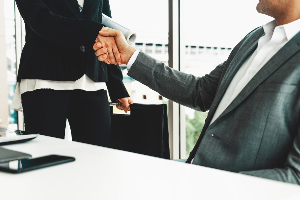 Handshake in a business meeting.