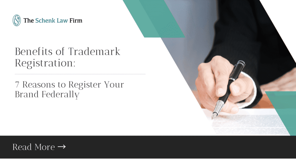 Business professional signing trademark document for brand protection.